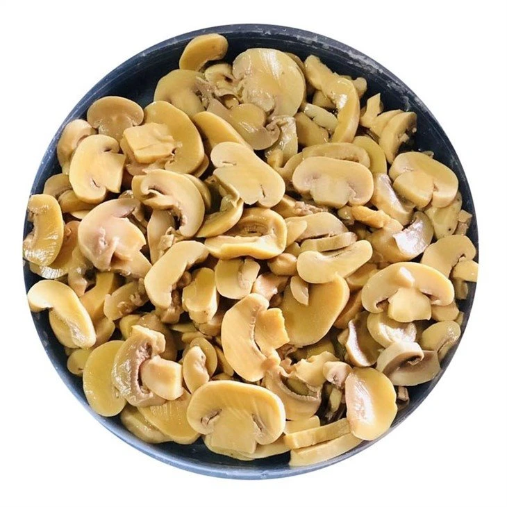 Sliced white mushroom in plastic drums